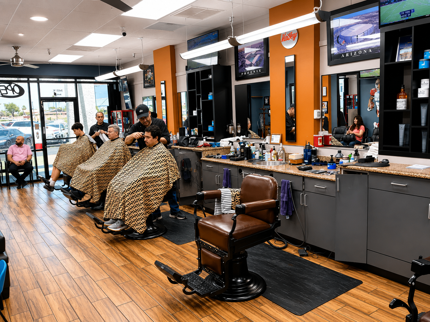 Busy interior view of Twins Barber Shop with customers in the chairs
