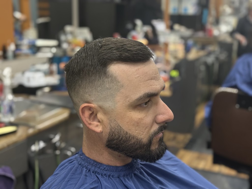 Clean skin fade haircut with beard trim at Twins Barber Shop Phoenix