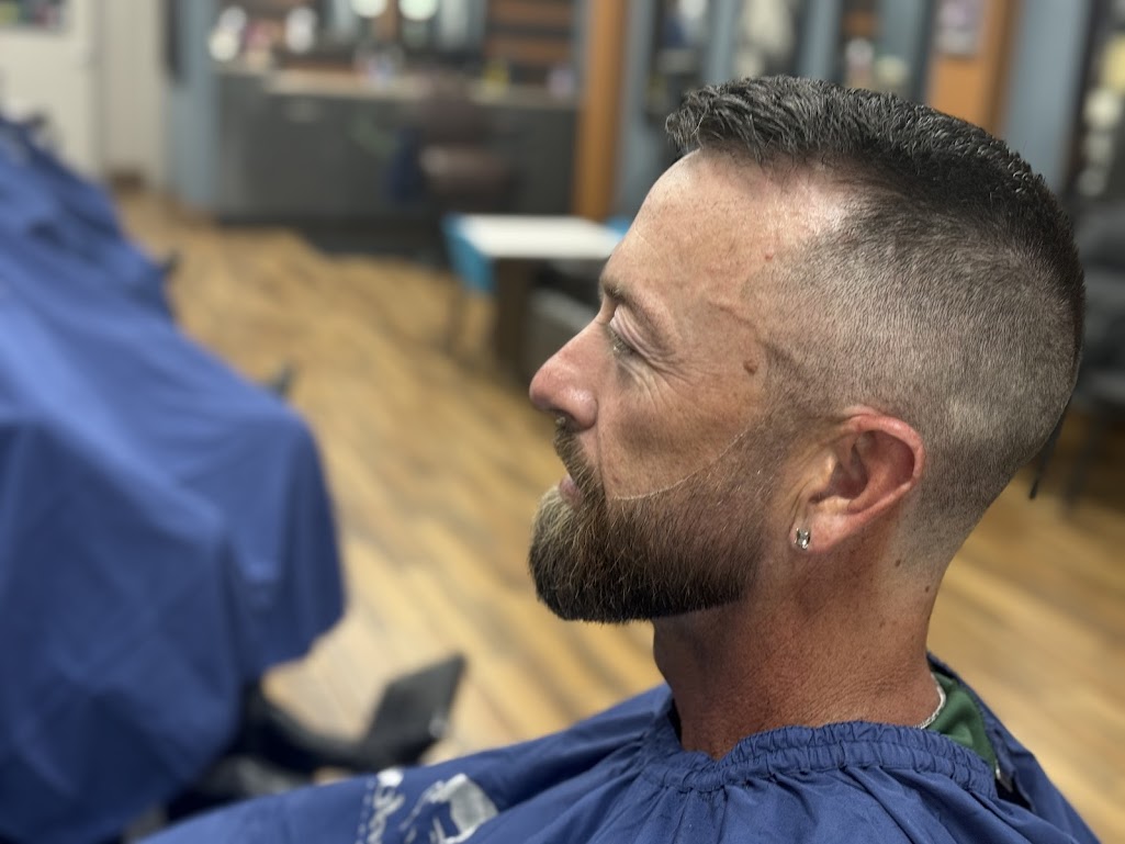 Bald fade crew cut with goatee at Twins Barber Shop North Mountain Village