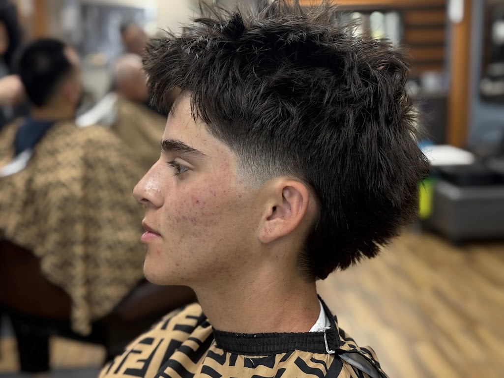 Textured mullet with mid drop fade by Twins Barber Shop